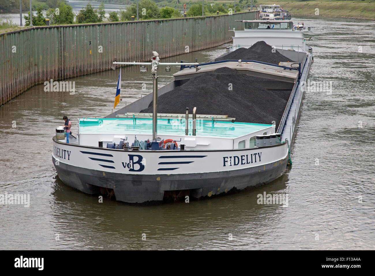 Barge transporting  pulversied coal on Mosel River Germany Stock Photo