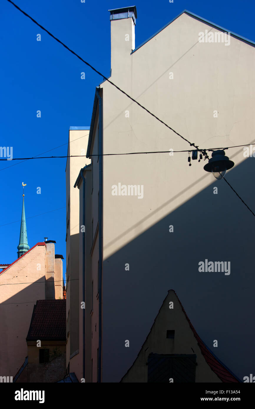 Latvia. Riga. The unusual geometry of light and shadow facade and spire ...
