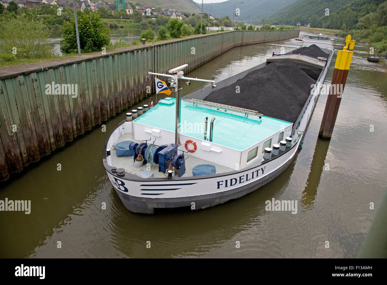 Barge transporting  coal on Mosel River Germany Stock Photo