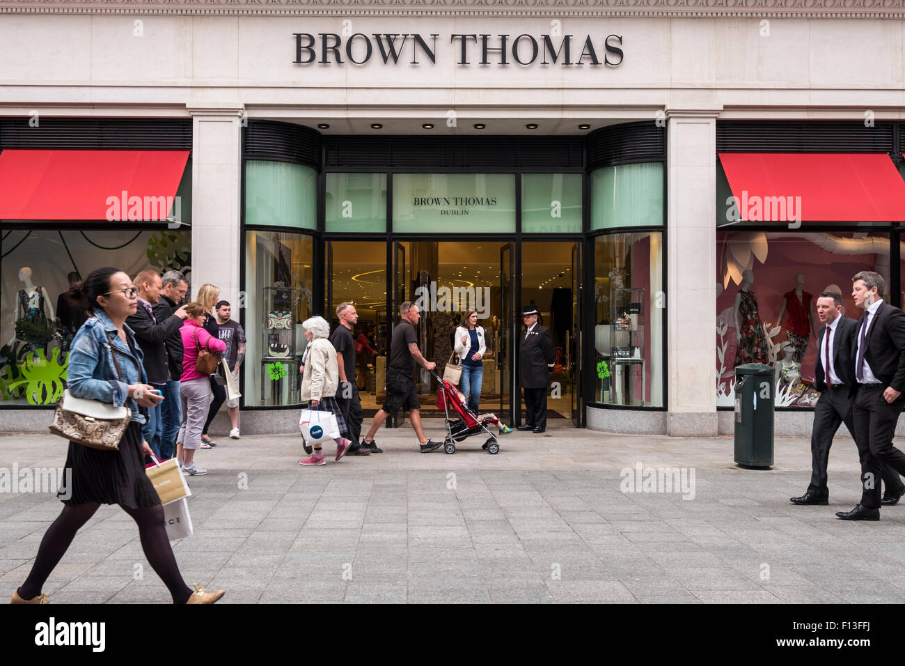 Shoppers passing Brown Thomas department store on Dublins Grafton