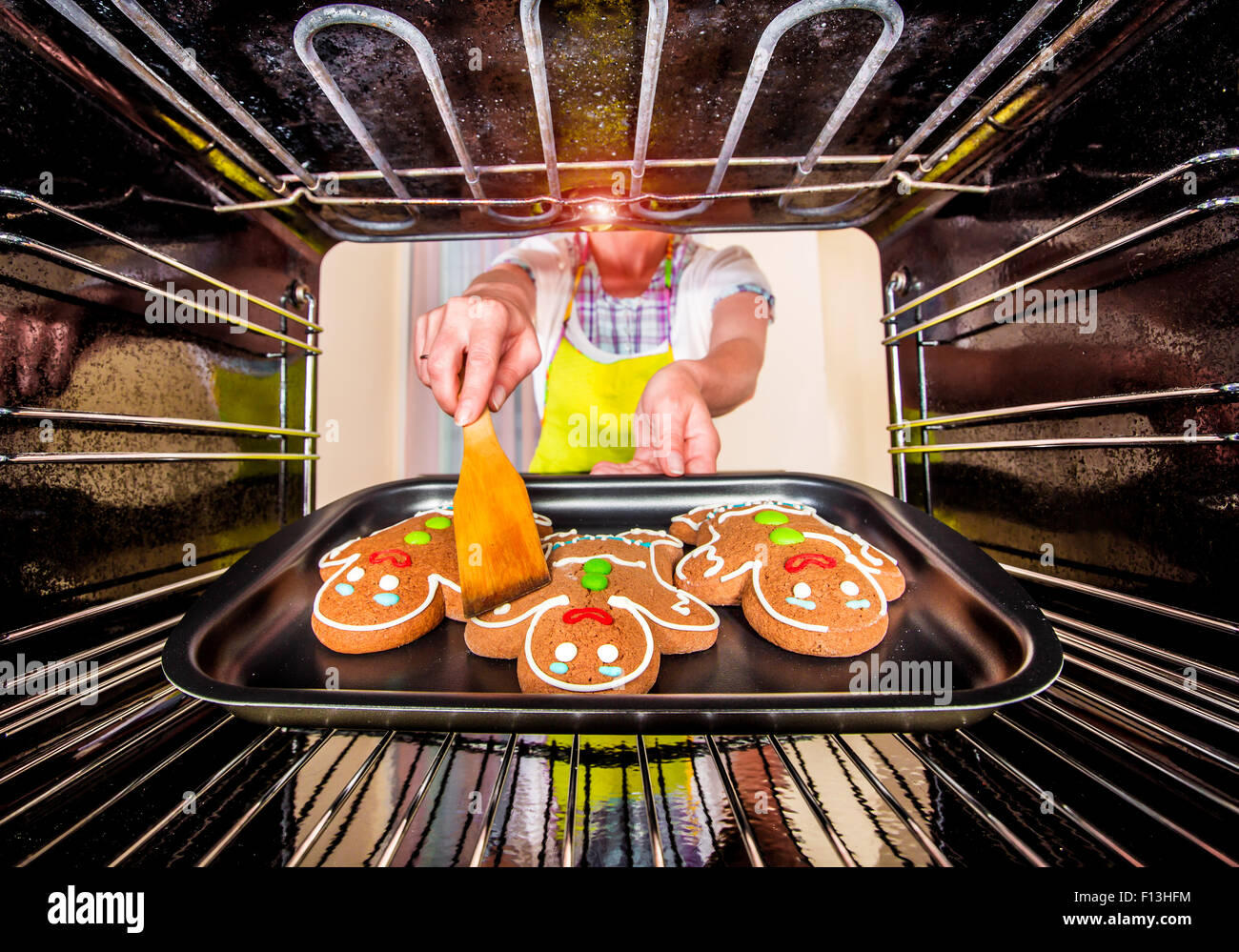 Baking Gingerbread man in the oven, view from the inside of the oven ...