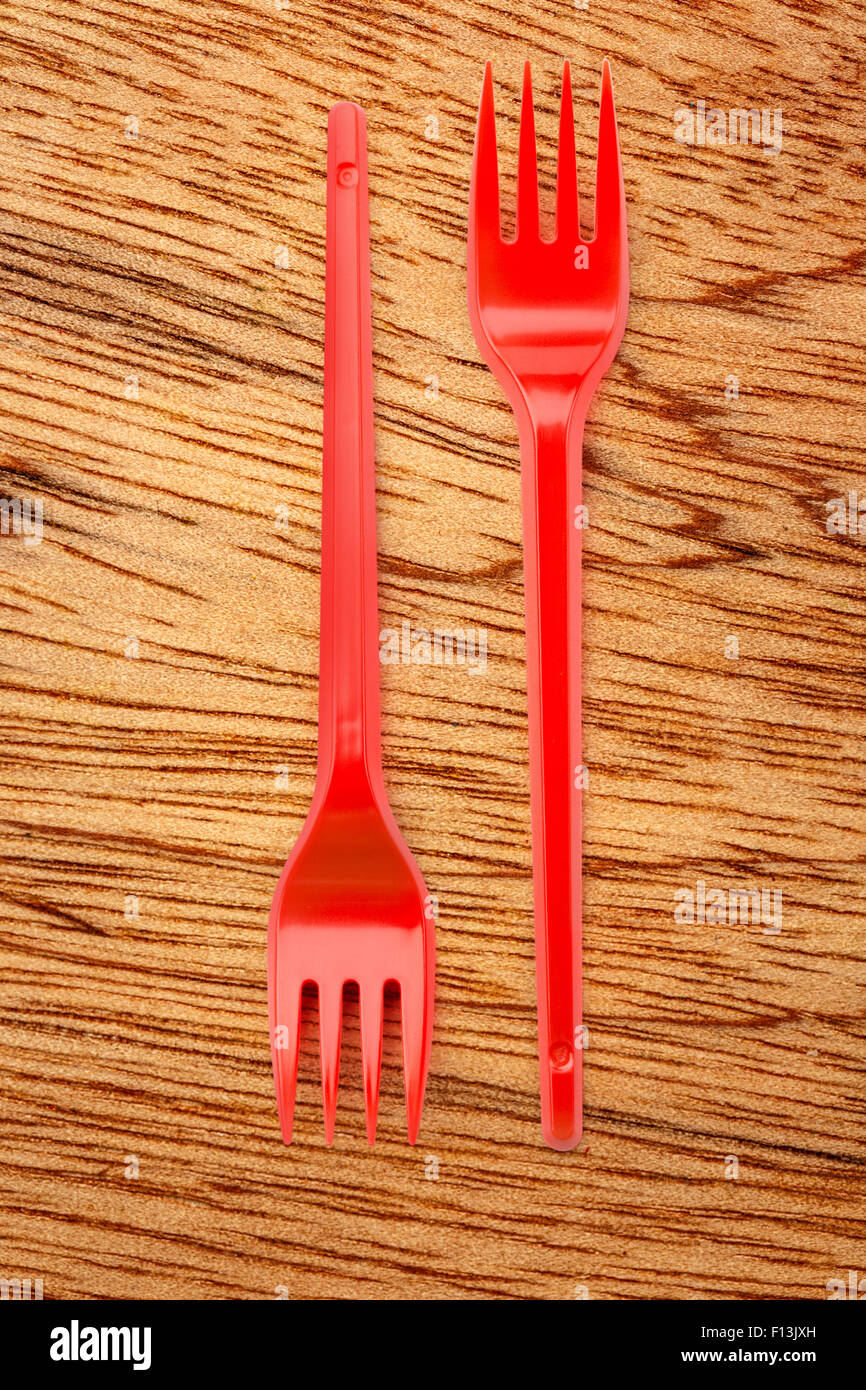 Red plastic forks vertical in close up Stock Photo Alamy