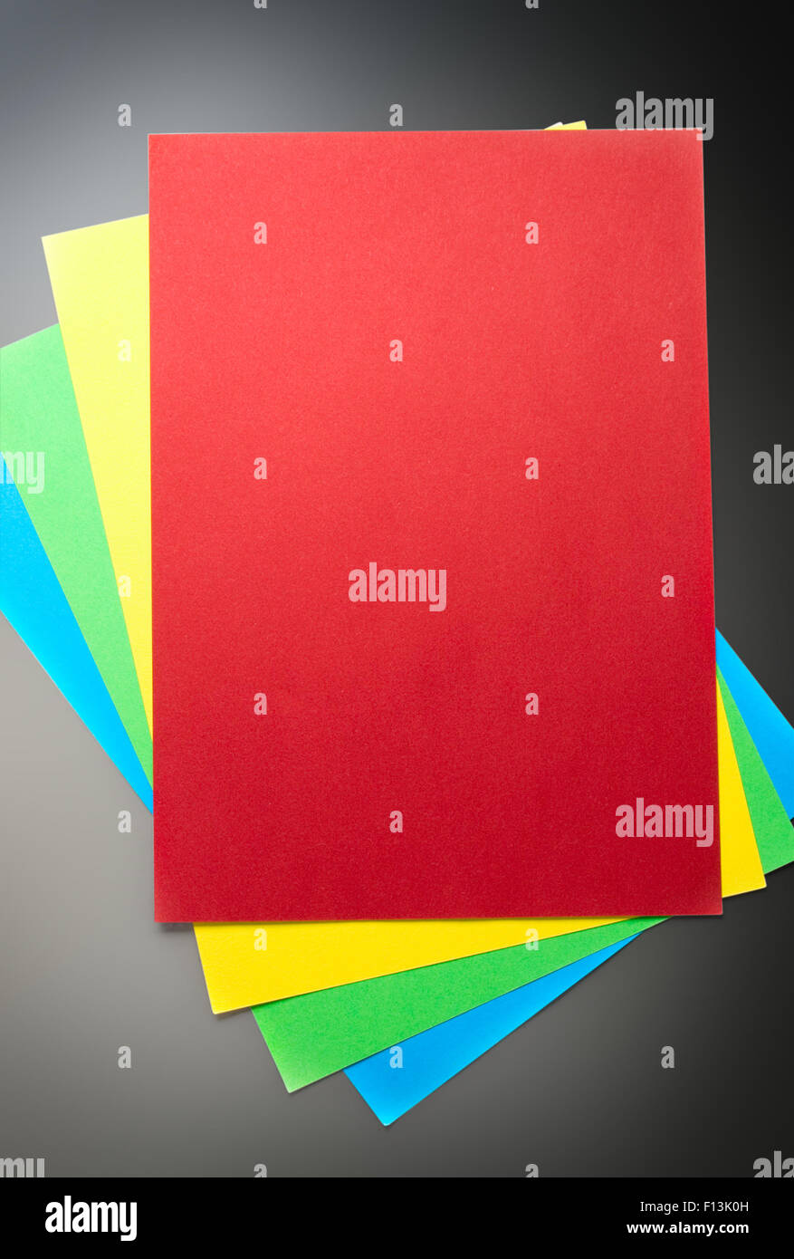 New blank colored paper lists in closeup Stock Photo - Alamy