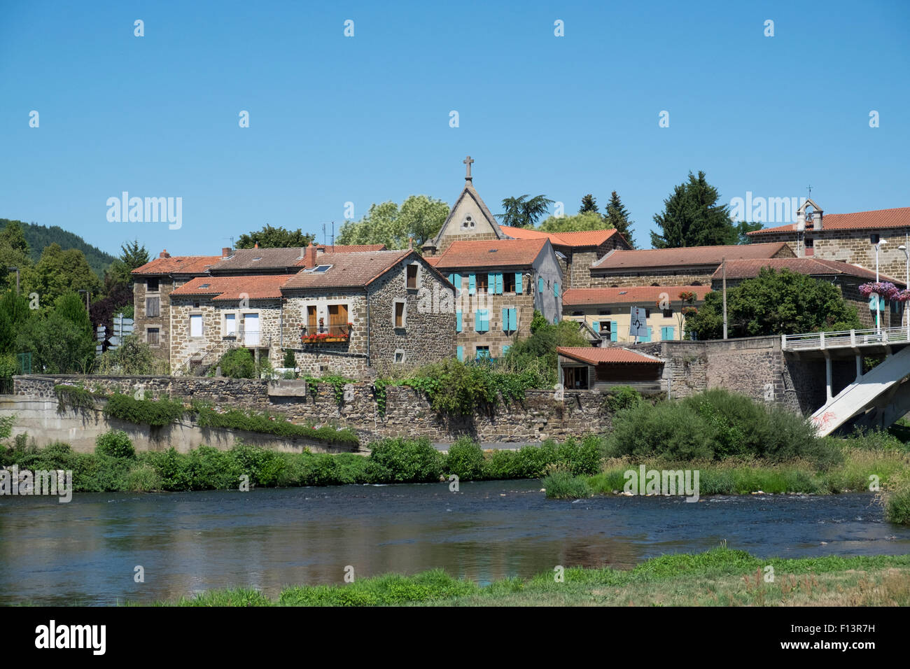 The River Allier flowing through the town of  Langeac, Haute-Loire, Auvergne, France Stock Photo