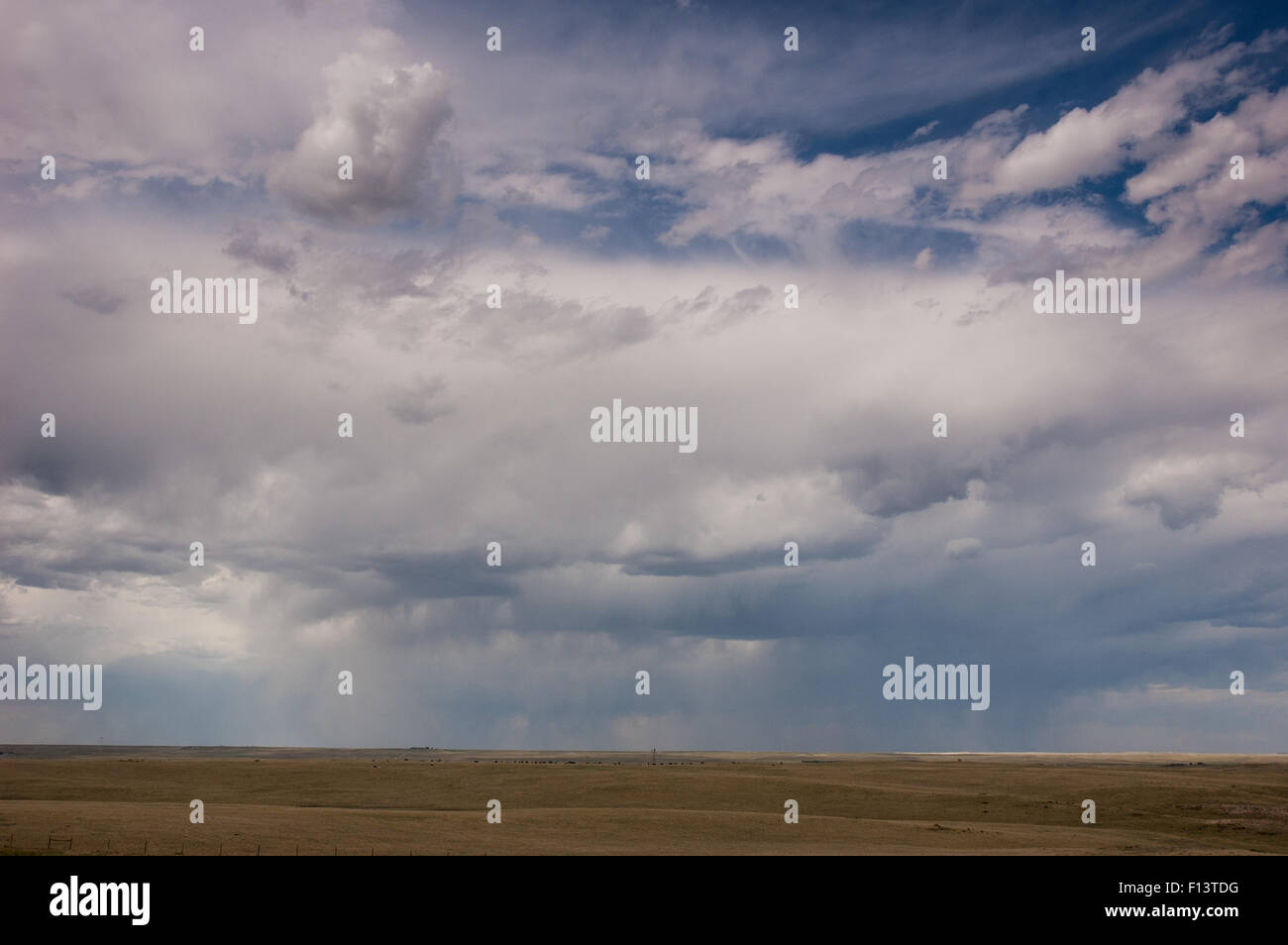 Rain clouds over Nebraska with wind turbines on horizon Stock Photo - Alamy