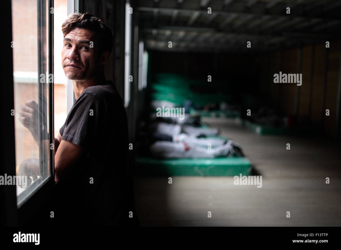 Bogota. 25th Aug, 2015. Image taken on Aug. 25, 2015 shows a homeless man standing at the Center for Self-Care 'Bakata' in Bogota, Colombia. According to local press, during the 2015, several shelters and special centers have been opened in order to provide protection and a better quality of life to people in the streets. According to the latest data from the District Department of Social Integration, Bogota has a population of about 9,000 people homeless. © John Paz/Xinhua/Alamy Live News Stock Photo