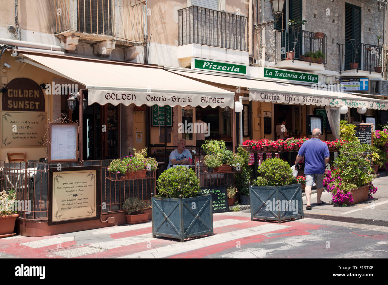 Golden Sunset Osteria Birreria Restaurant, Taormina, Sicily, Italy Stock Photo