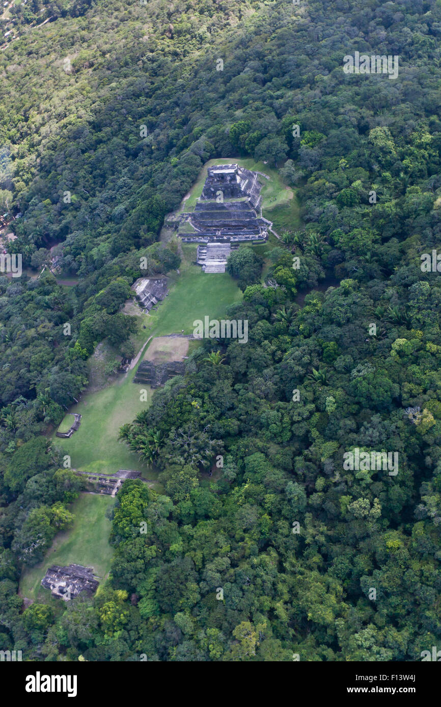 The Myan Temple of Xunantunich located in the Cayo District of Belize as seen from the air.  Jungle is encroaching on the ancien Stock Photo