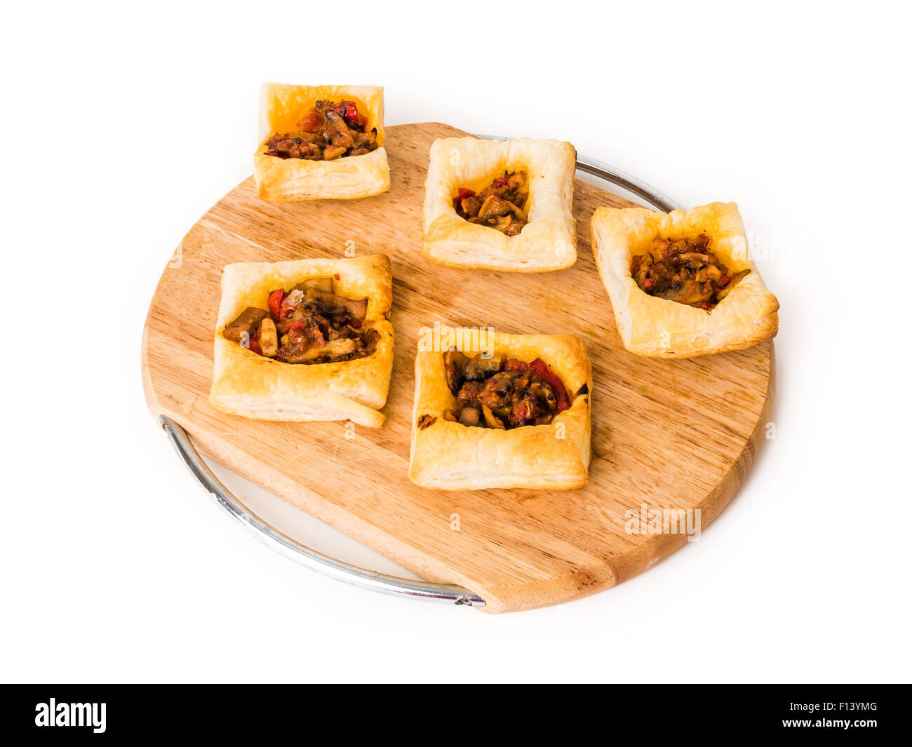 Vegeterian mushroom pastry, borek mediterranean mezze on white isolated background Stock Photo