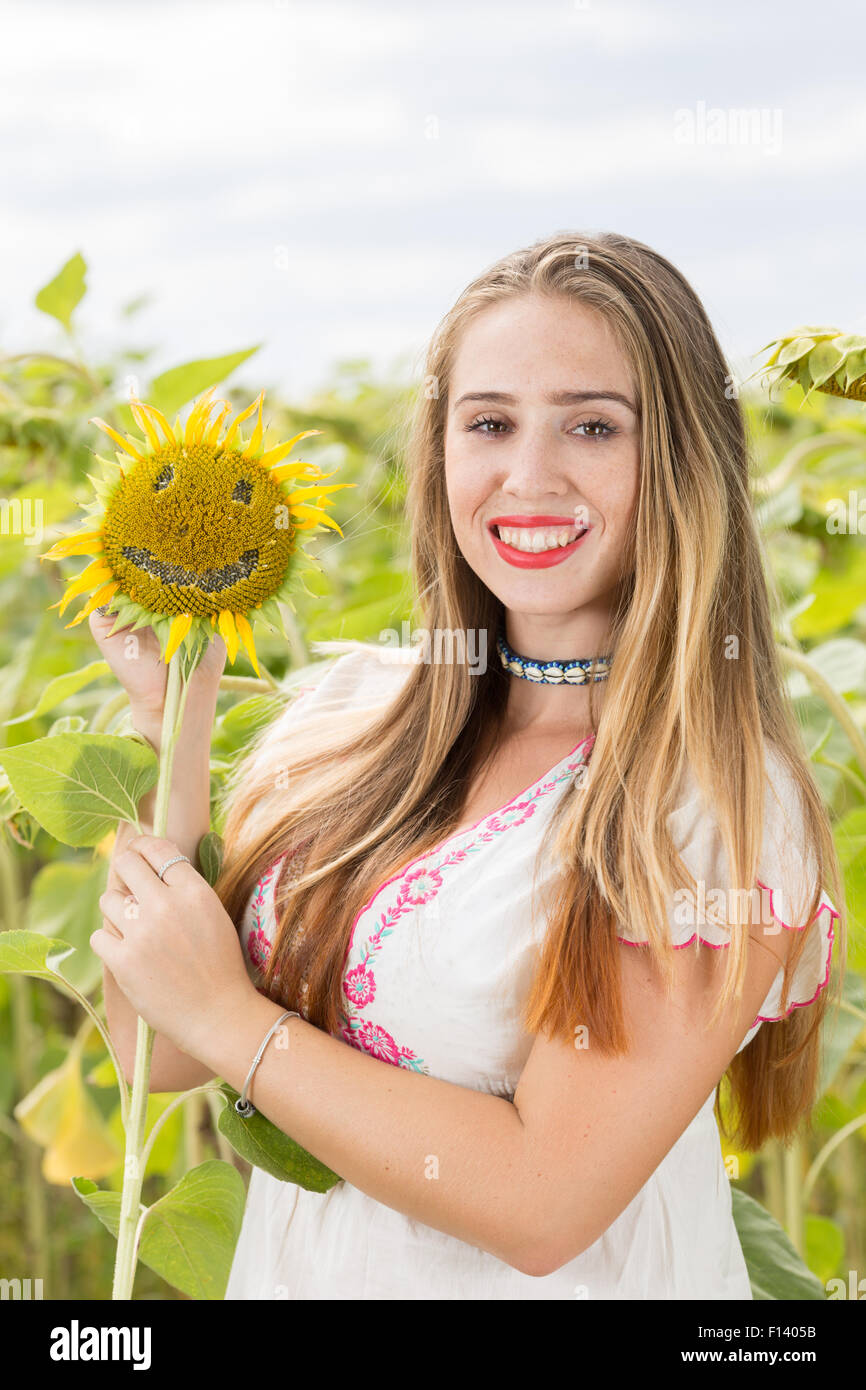 Girl with sunflower Stock Photo - Alamy