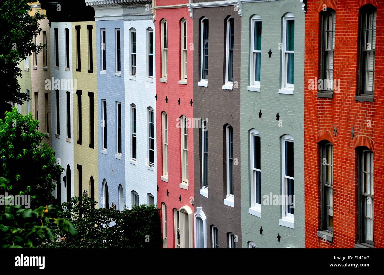 Baltimore, Maryland:  Colorful early 19th century homes line Montgomerey Street in the Federal Hill Historic District Stock Photo