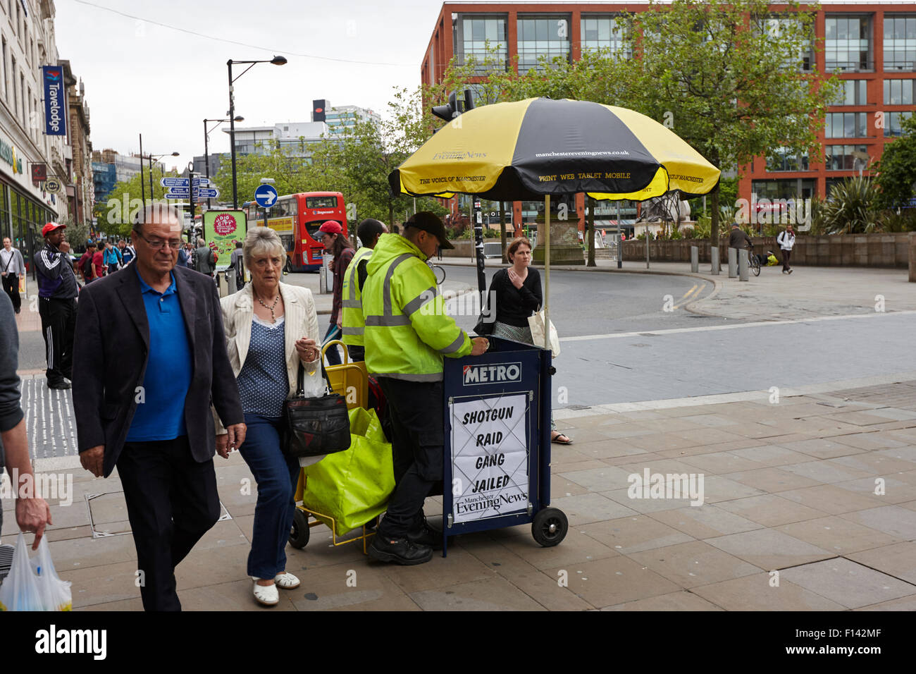 Manchester evening news newspaper vendor on street UK Stock Photo