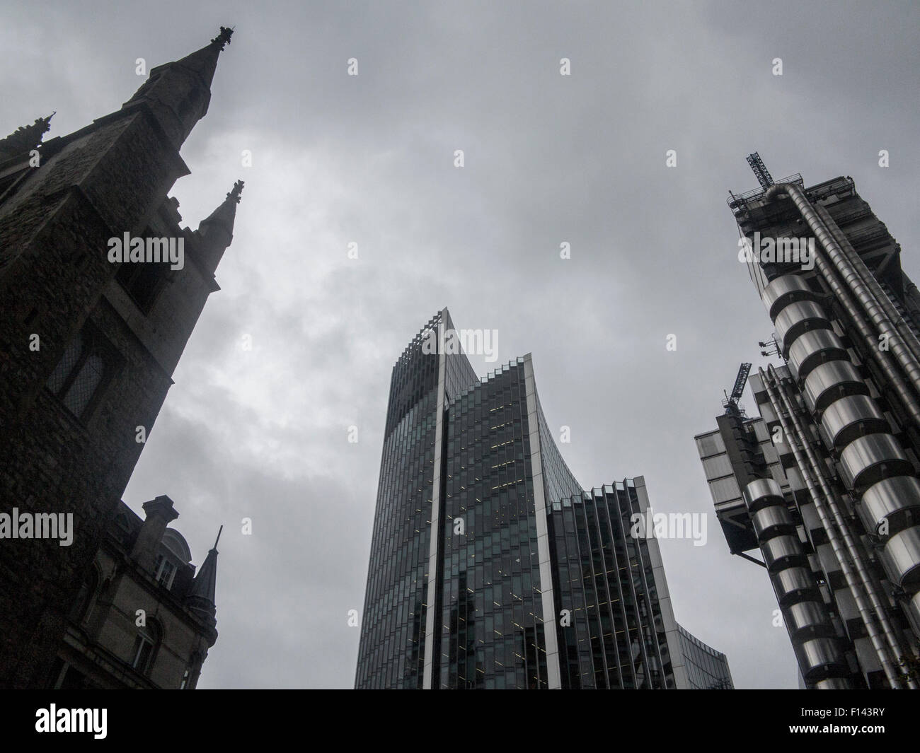 Grey skies over the Lloyds Building in the city of london financial district Stock Photo