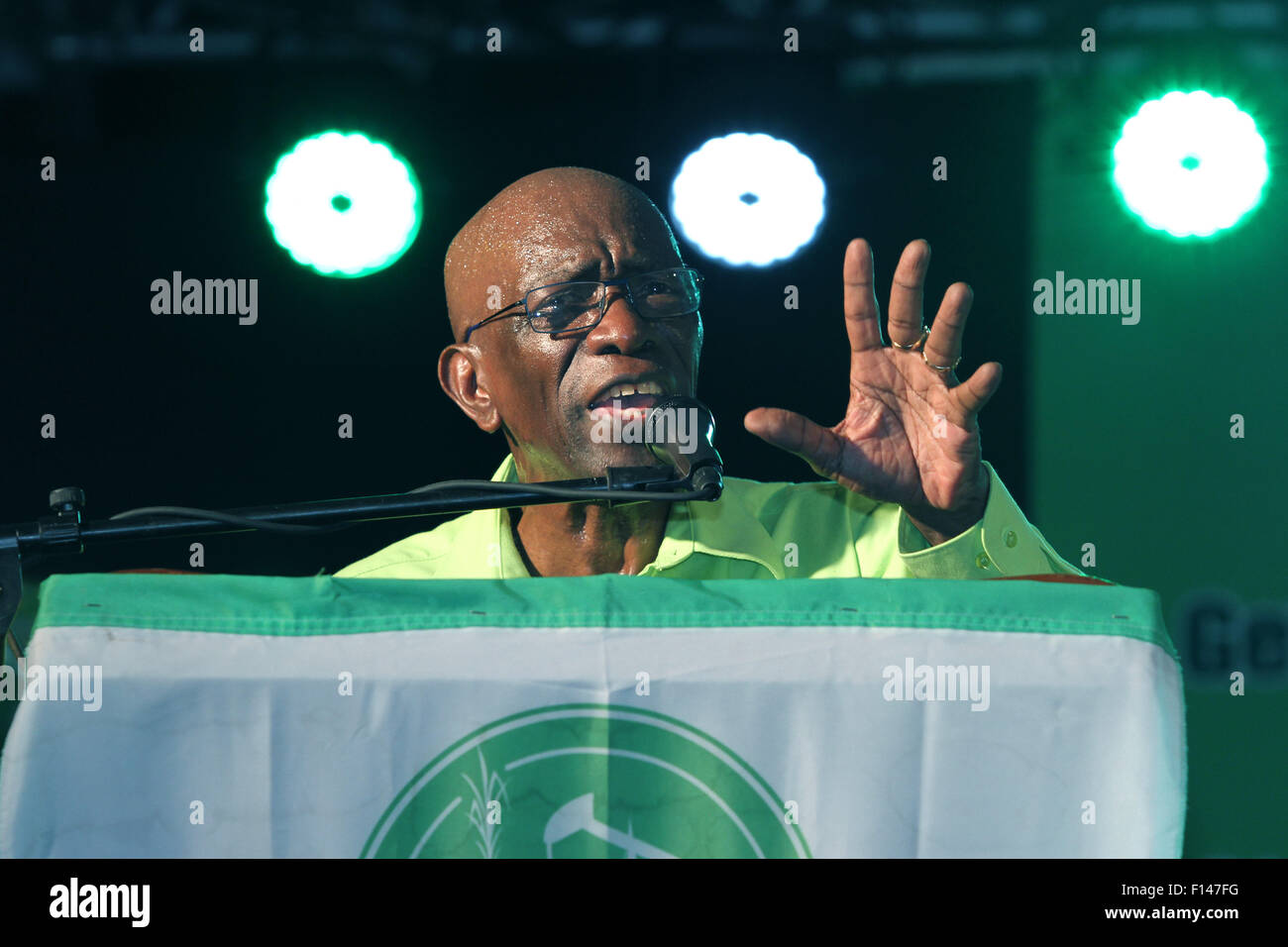 ST JOSEPH, TRINIDAD - AUGUST 25: Austin 'Jack' Warner, Leader of the Independent Liberal Party, speaks at an ILP public meeting in First Capital Park as part of the General Elections campaign on August 25, 2015 in St Joseph, Trinidad.  Mr. Warner is a former FIFA Vice President and a candidate of the ILP to represent the Chaguanas East constituency when elections are held on September 07, 2015.  (Photo by Sean Drakes/Alamy Live News) Stock Photo