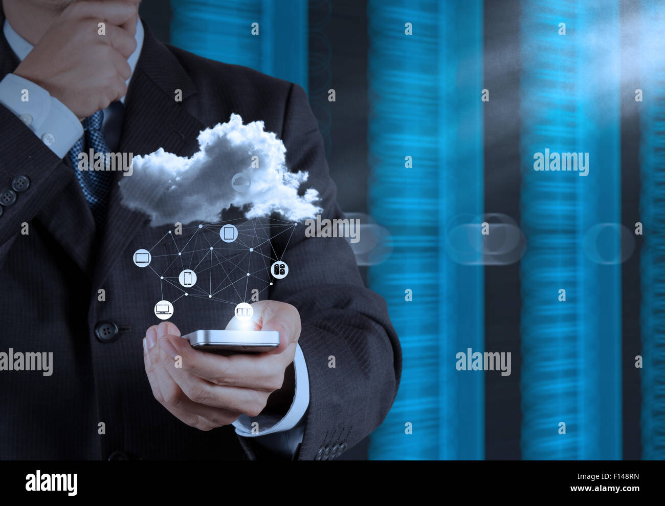 Businessman hand using mobile phone with Cloud Computing diagram on the ...
