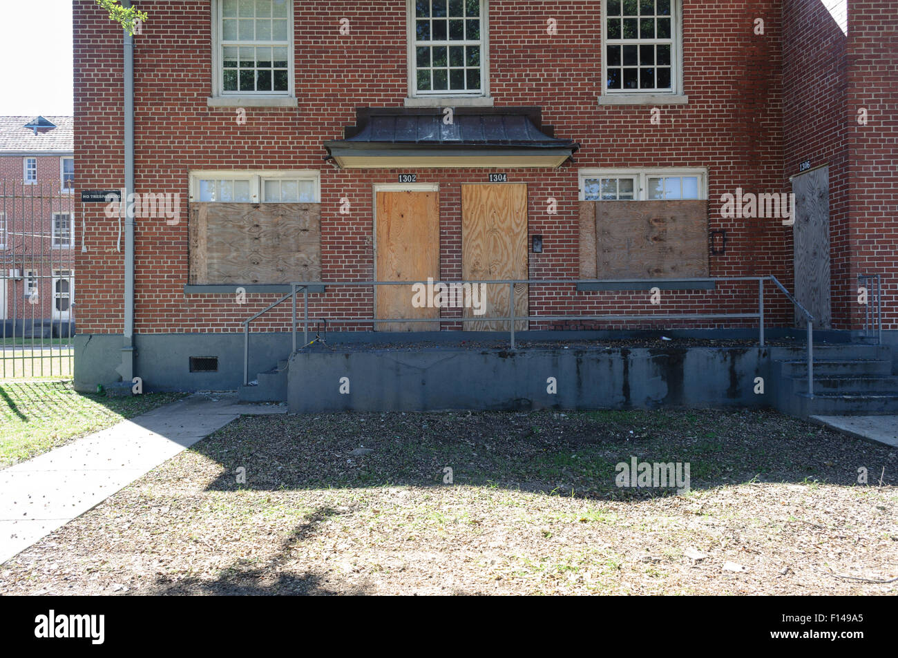 Boarded windows on the deserted Iberville housing project Stock Photo