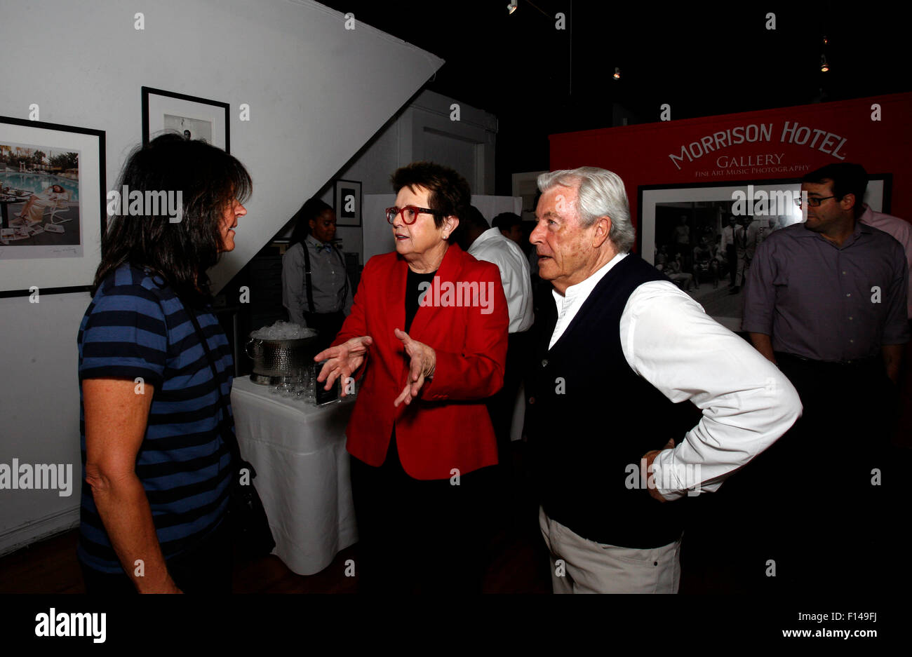 New York, USA. 26th August, 2015. Tennis legend Billie Jean King speaks with the british photographic legend Terry O'Neil during a reception at New York's Morrison Hotel Gallery in Soho on August 27th, 2015.   The event sponsored by Citibank was to promote a show and book by O'Neil who photographed King and other celebrities extensively in the 1970's and 80's. Credit:  Adam Stoltman/Alamy Live News Stock Photo