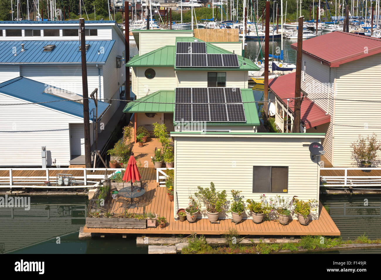Solar panels on rooftops on a floating house Portland Oregon. Stock Photo