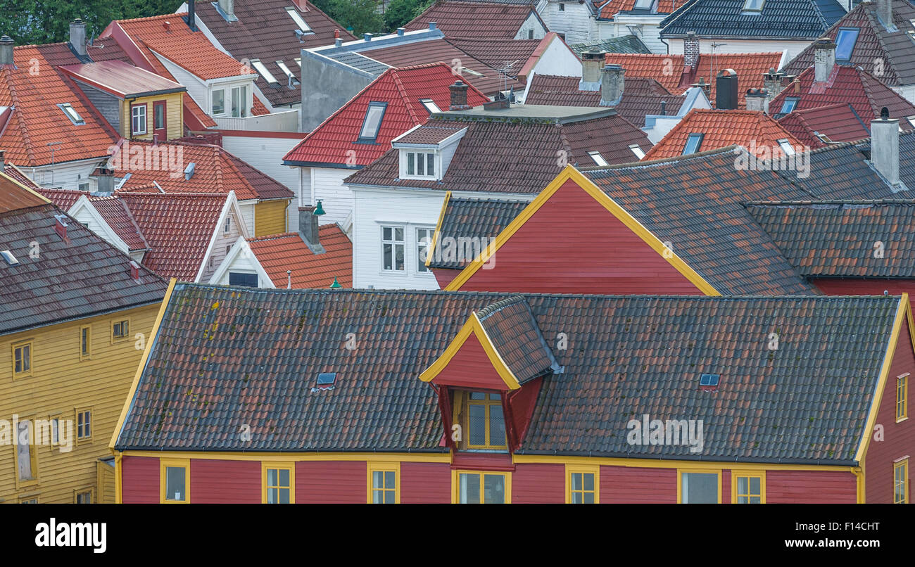 Typical roof line of Norwegian buildings of tiled roofs and using timber frames and cladding. Stock Photo
