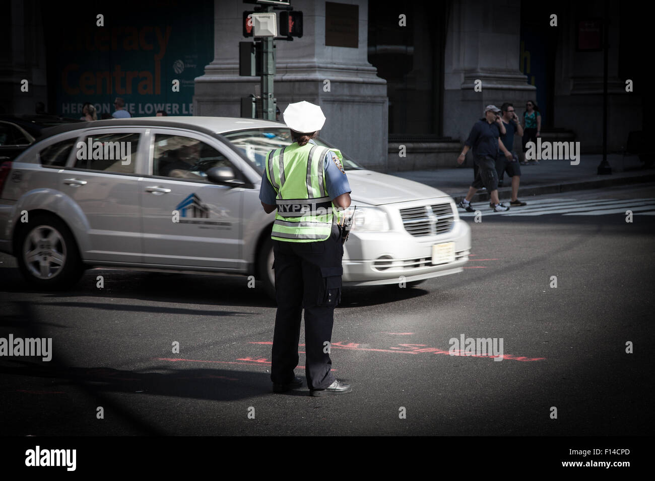 Traffic policewoman on intersection in New York City Stock Photo