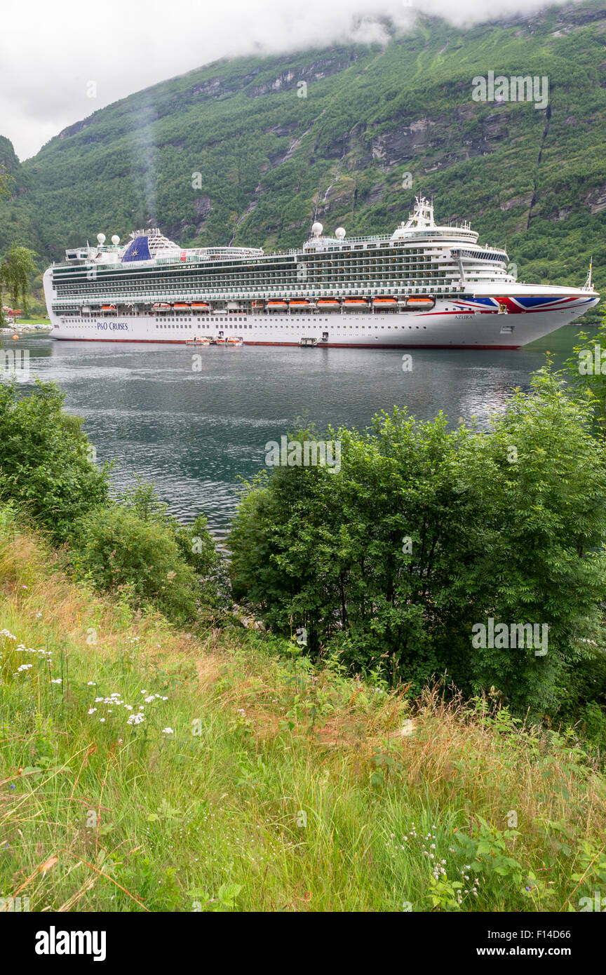 P&O cruise ship Azura moored at the Norwegian town of Geiranger, Geirangerfjord. Stock Photo
