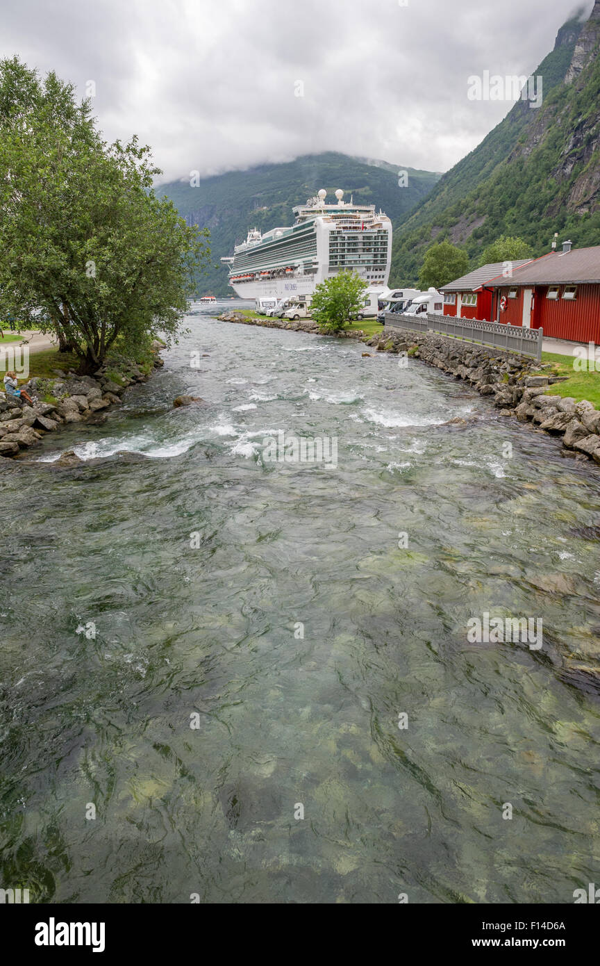 P&O cruise ship Azura tied to the mooring buoys in the Geiranger fjord, Geiranger, Norway Stock Photo