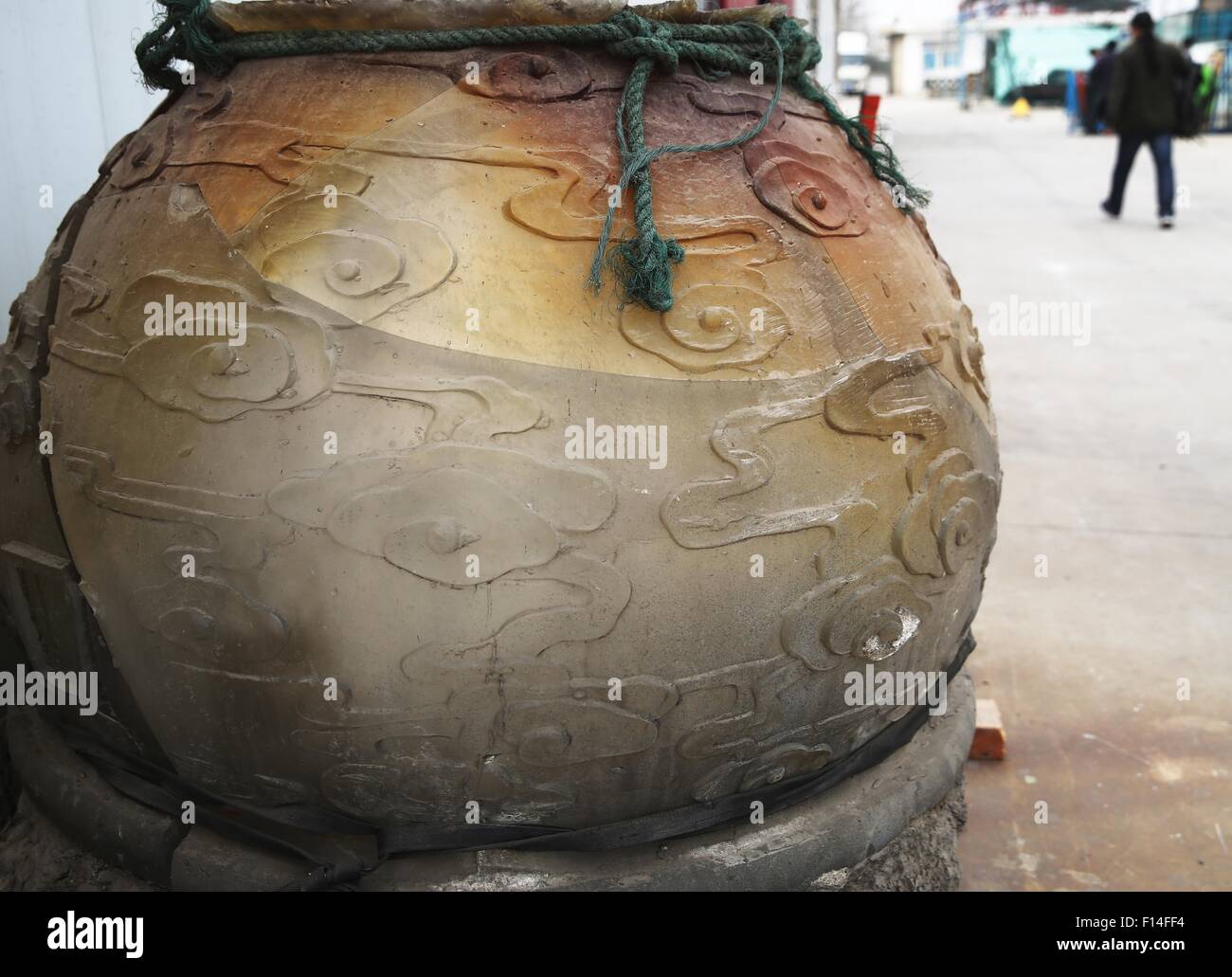 Qinhuangdao, Hebei, CHN. 30th Mar, 2015. Qinhuangdao, CHINA - March 30 2015: (EDITORIAL USE ONLY. CHINA OUT) Coloured glaze is a kind of traditional handicraft, and its raw material is colorful (color is by all kinds of rare metals formation) man-made crystal (including 24% of PbO2), and made from the ancient bronze dewaxing method at high temperature. It's fascinating dazzling. Origin of ancient coloured glaze manufacturing can trace back to the Western Zhou Dynasty, and the initial production of coloured glaze material is obtained as a by-product generated from the bronze casting after re Stock Photo