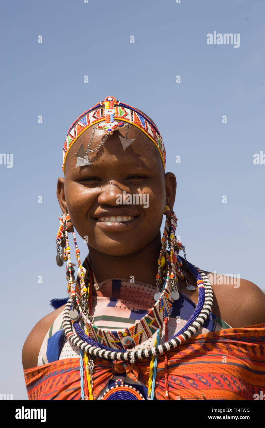 SMILING MASAI WOMAN WEARING BEADED JEWELRY Stock Photo
