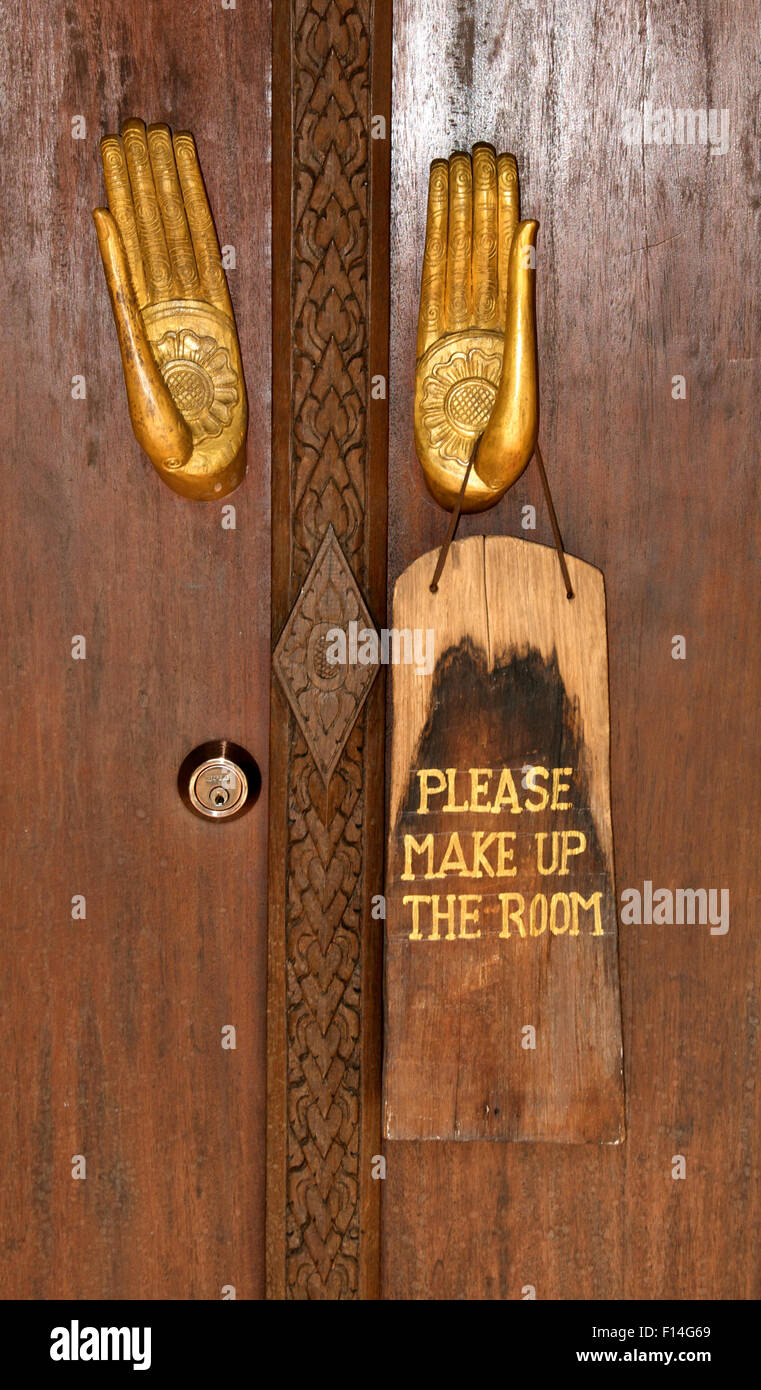hotel room door with sign  please make up the room Luang Prabang Laos Stock Photo