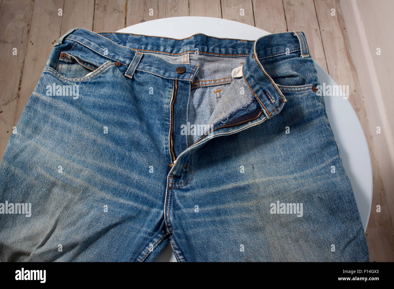 Detail of the zip fly on a worn pair of Levi jeans Stock Photo - Alamy