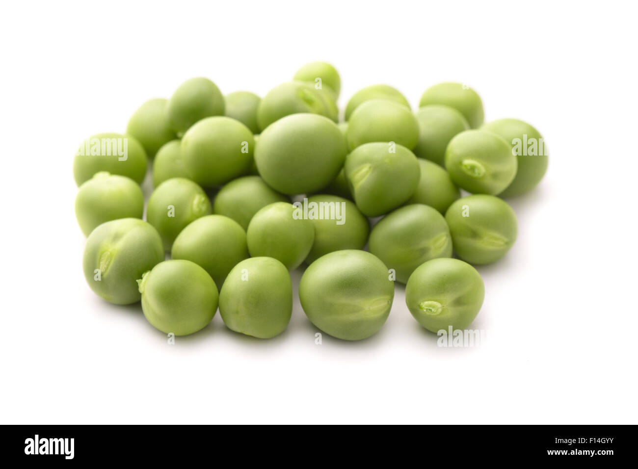 Fresh green peas isolated on white Stock Photo Alamy