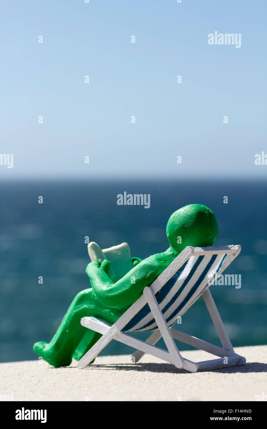 Plasticine Person in Deck Chair Stock Photo