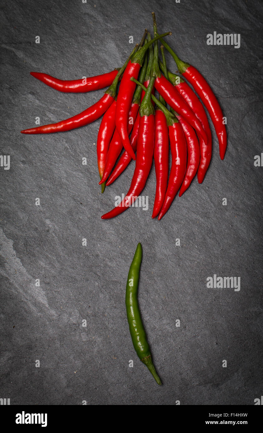 frame of red and green Chile pepper on black background Stock Photo - Alamy