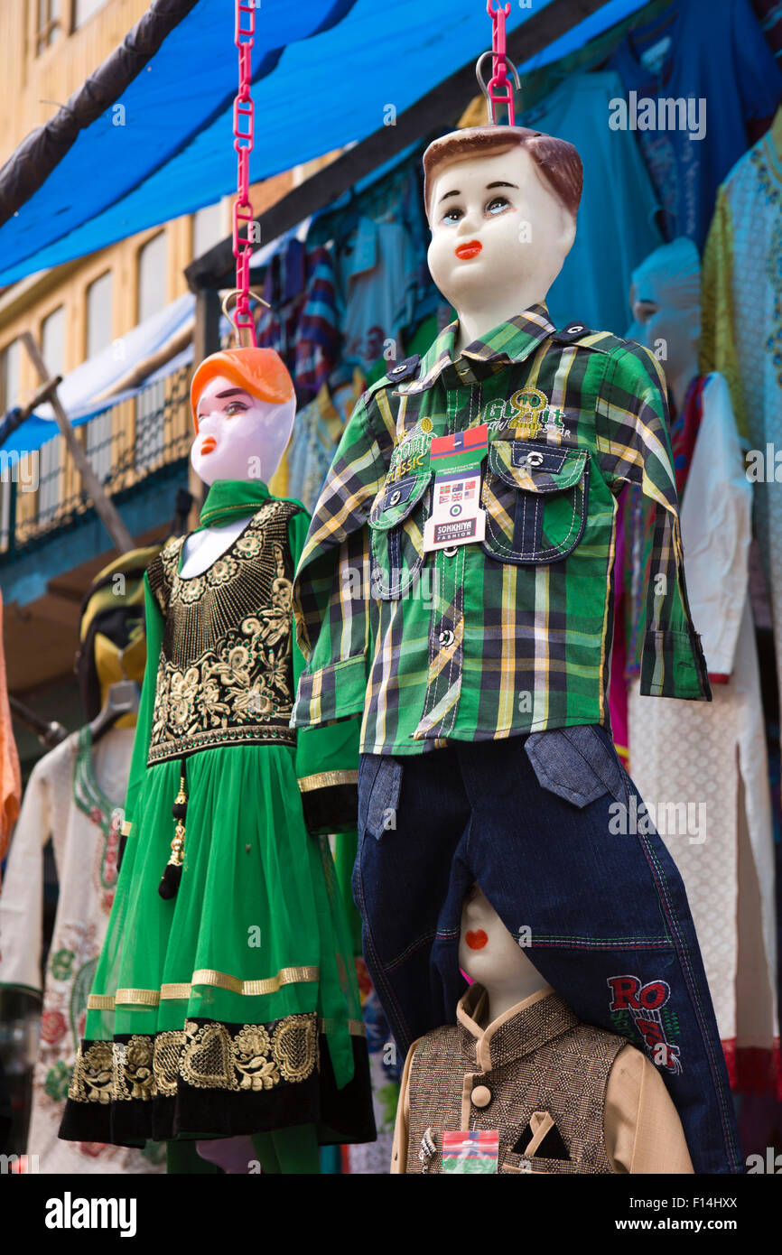 India, Jammu & Kashmir, Srinagar, Hazratbal, childrens clothes hanging outside shop Stock Photo