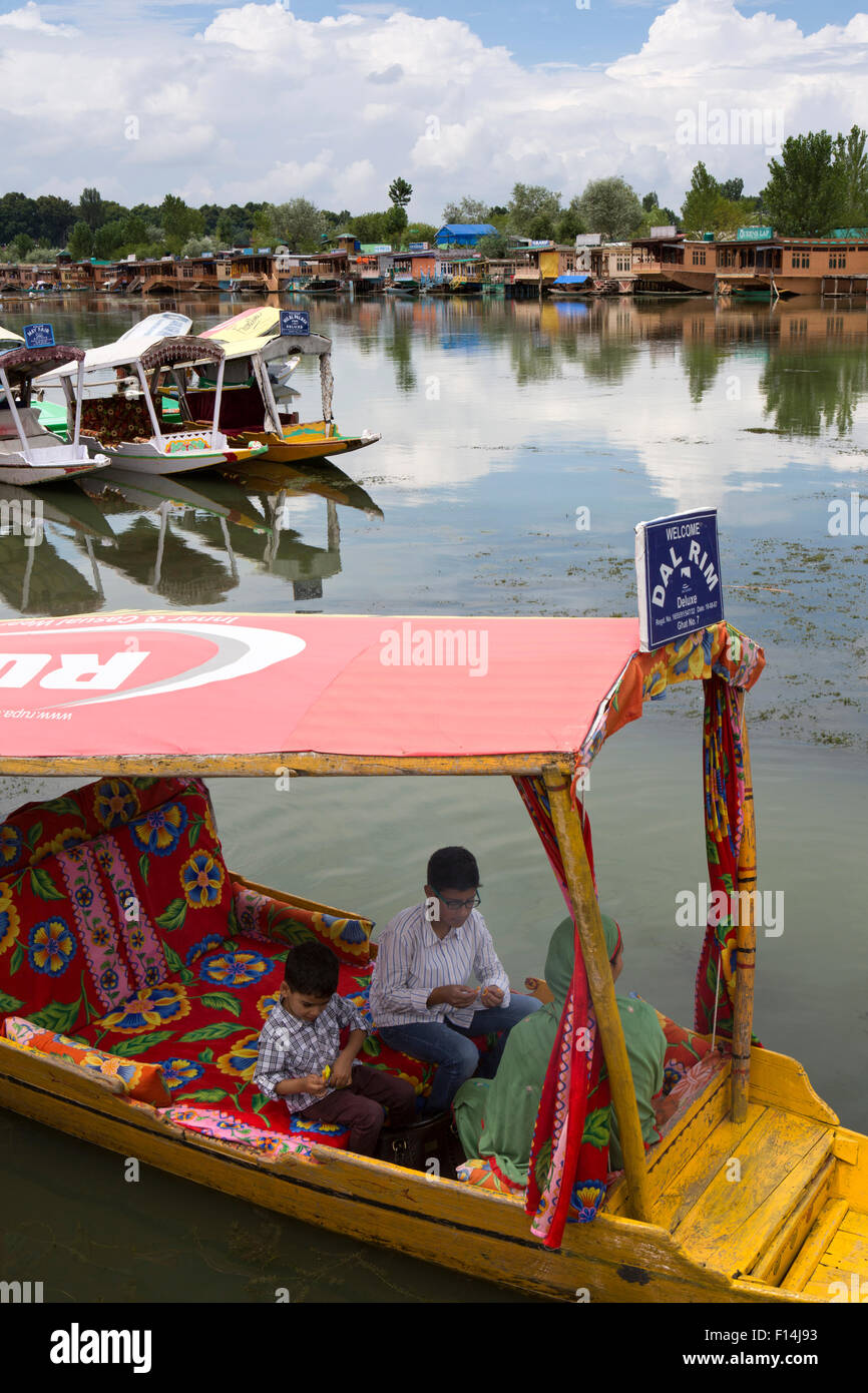 India, Jammu & Kashmir, Srinagar, family in shikara taxi boats on Dal Lake Stock Photo