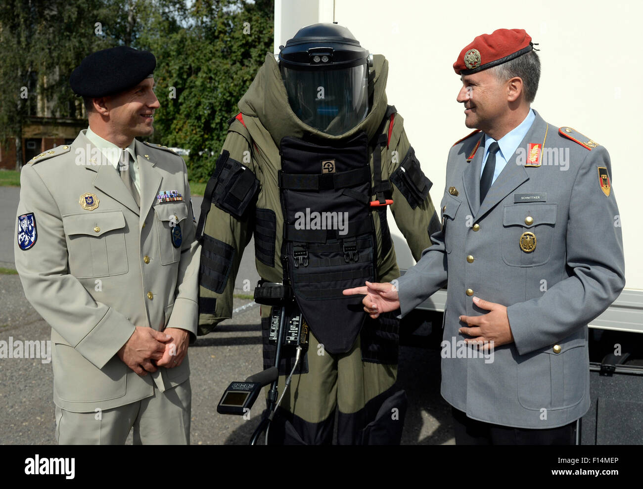 Prague, Czech Republic. 27th Aug, 2015. German military police chief Udo Schnittker visits (right) a presentation of Czech military police's equipment in Prague, Czech Republic, August 27, 2015. Pictured left Czech military police chief Pavel Kriz. © Michal Krumphanzl/CTK Photo/Alamy Live News Stock Photo