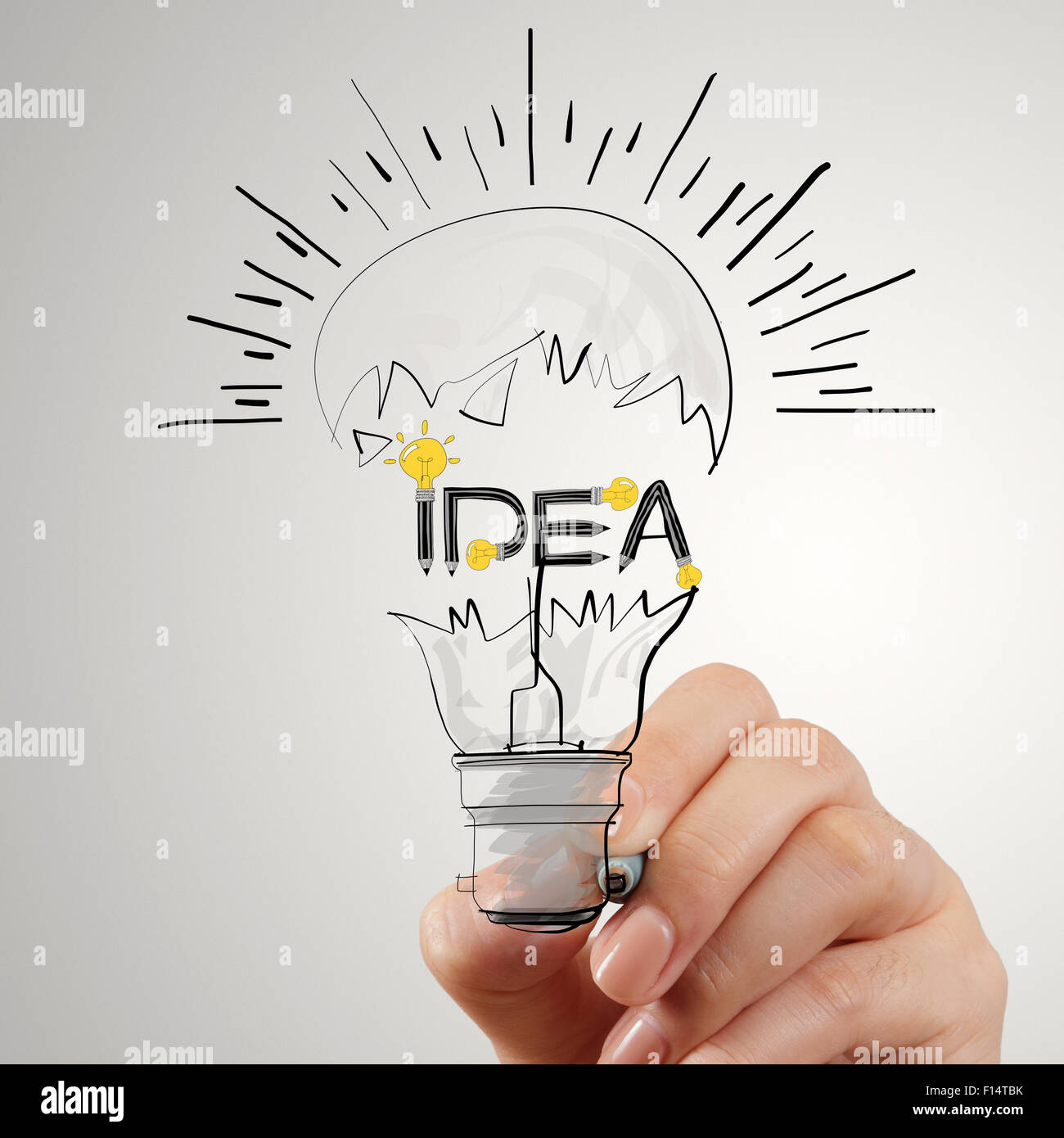 hand drawing light bulb and IDEA word design as concept Stock