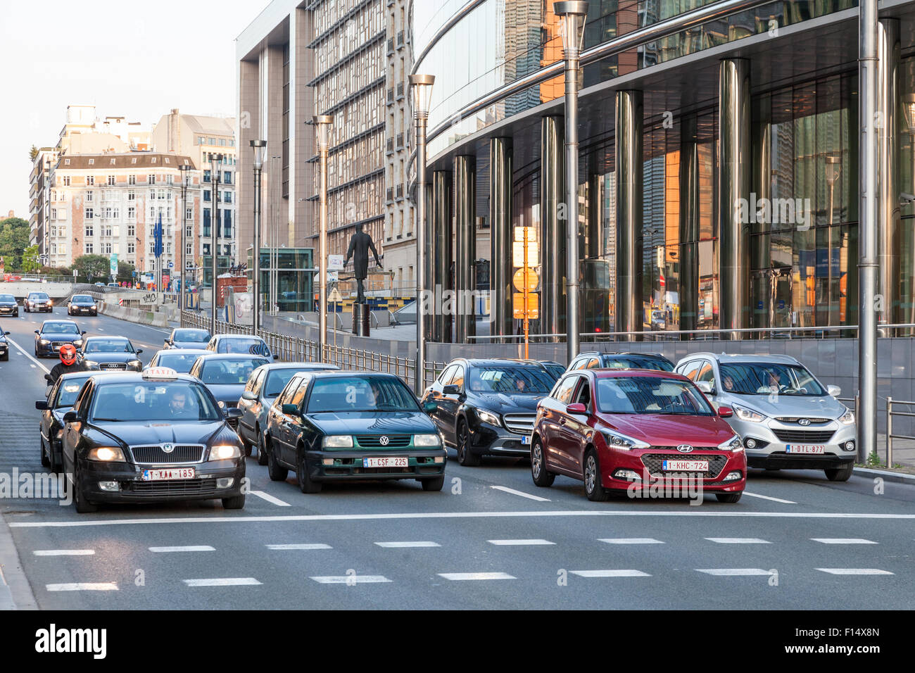 Cars waiting at pedestrian crossing in a street in the city of Brussels ...