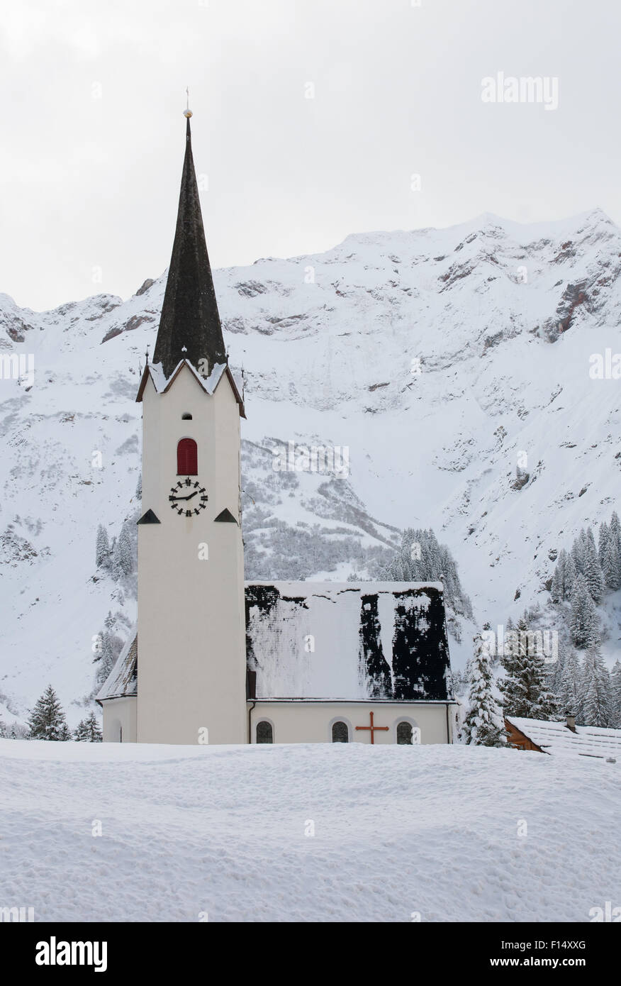 A small church, in a tiny village in the Austrian Alps Stock Photo