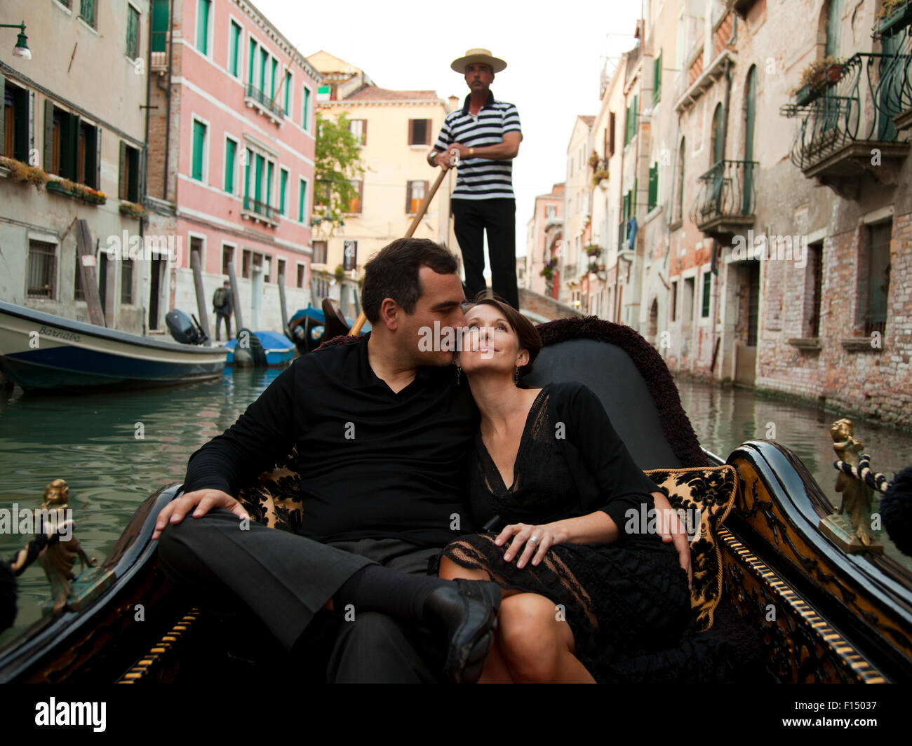 Italy, Venice, Mature couple embracing in gondola Stock Photo Alamy