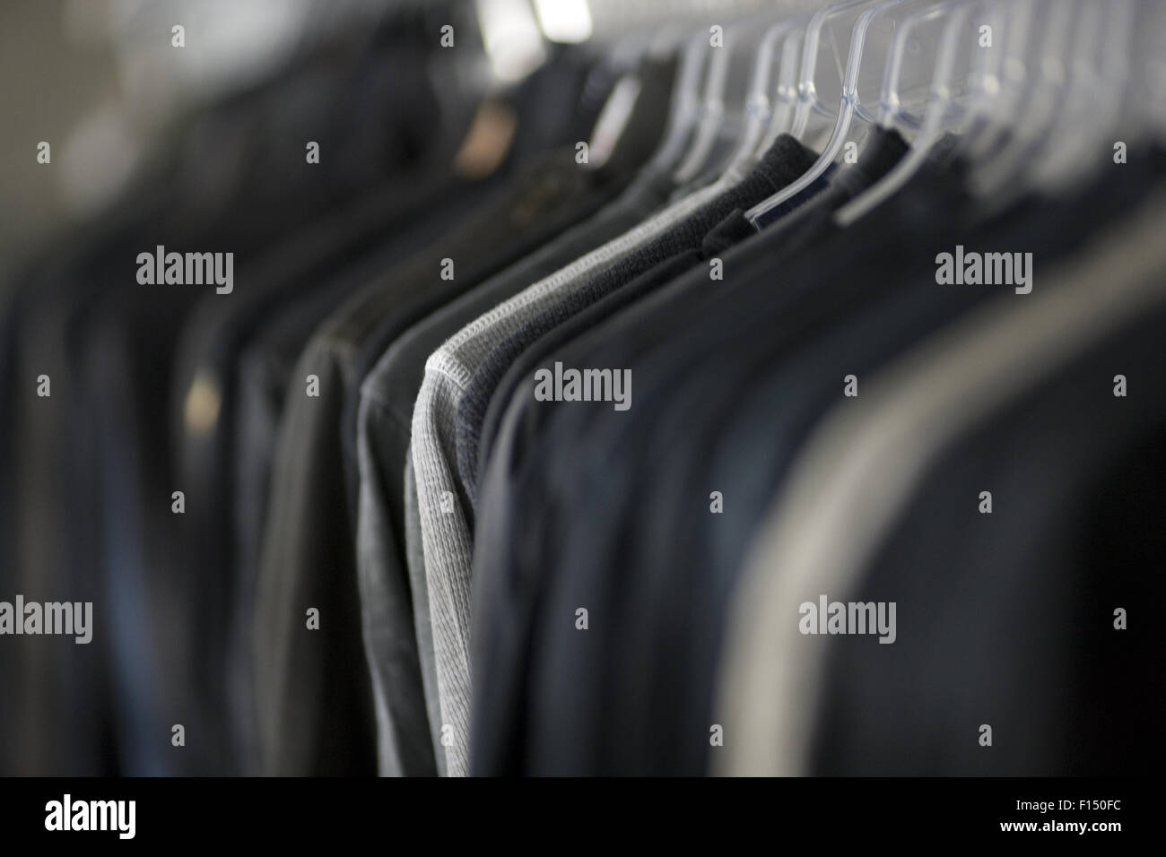 USA, Utah, Salt Lake City, Suits hanging on rail Stock Photo Alamy