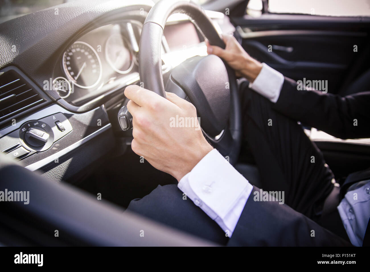 Closeup portrait of a male hands driving car Stock Photo