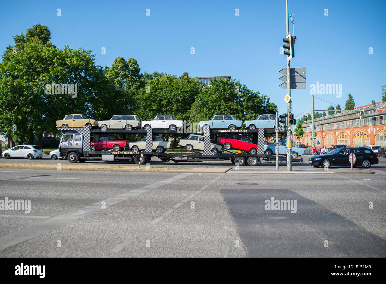 Trabant cars loaded on a car carrier trailer, Berlin Stock Photo