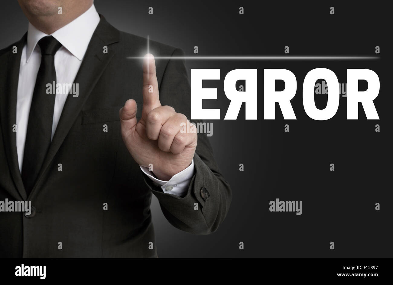 error touchscreen is operated by businessman concept. Stock Photo