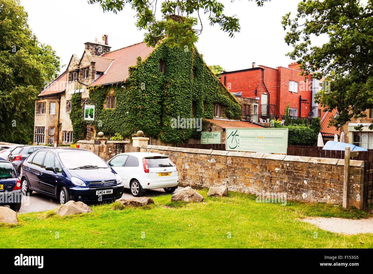 Mallyan Spout Hotel pub restaurant building Goathland North Yorkshire UK England exterior front sign Stock Photo