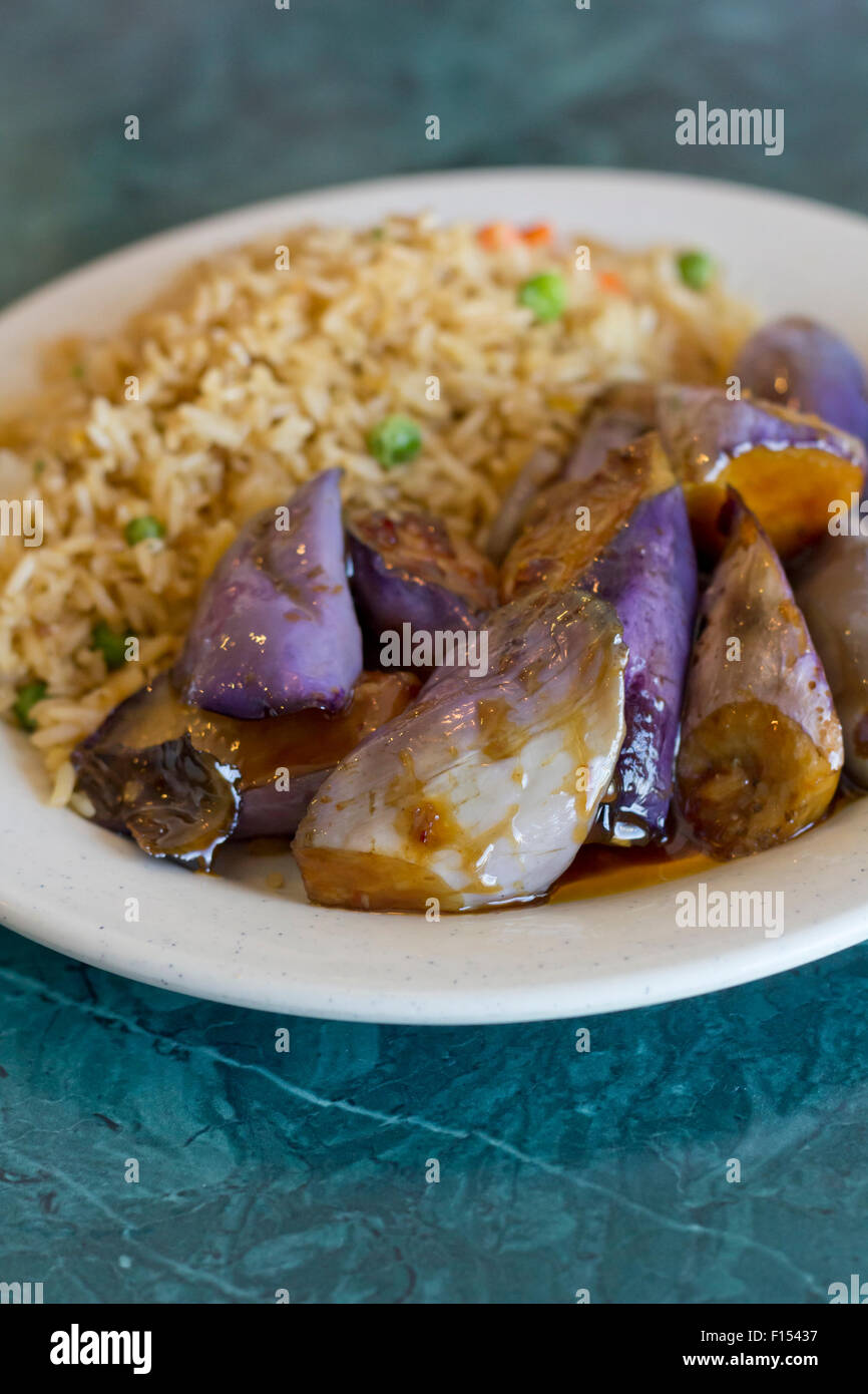Chinese sauteed eggplant with oyster sauce and fried rice Stock Photo
