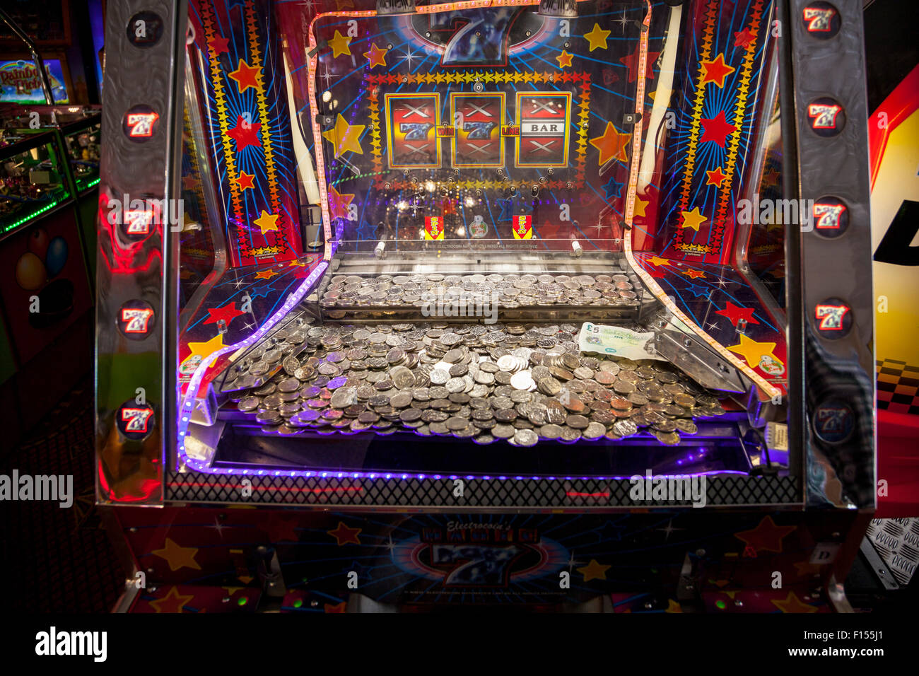 Coin pusher gambling machine Stock Photo