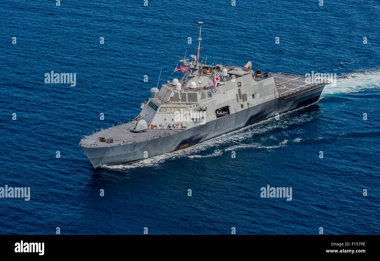 The U.S. Navy littoral combat ship USS Fort Worth assembles in formation with the Royal Malaysian Navy as part of CART Malaysia training exercises August 19, 2015 in the Sulu Sea. Stock Photo