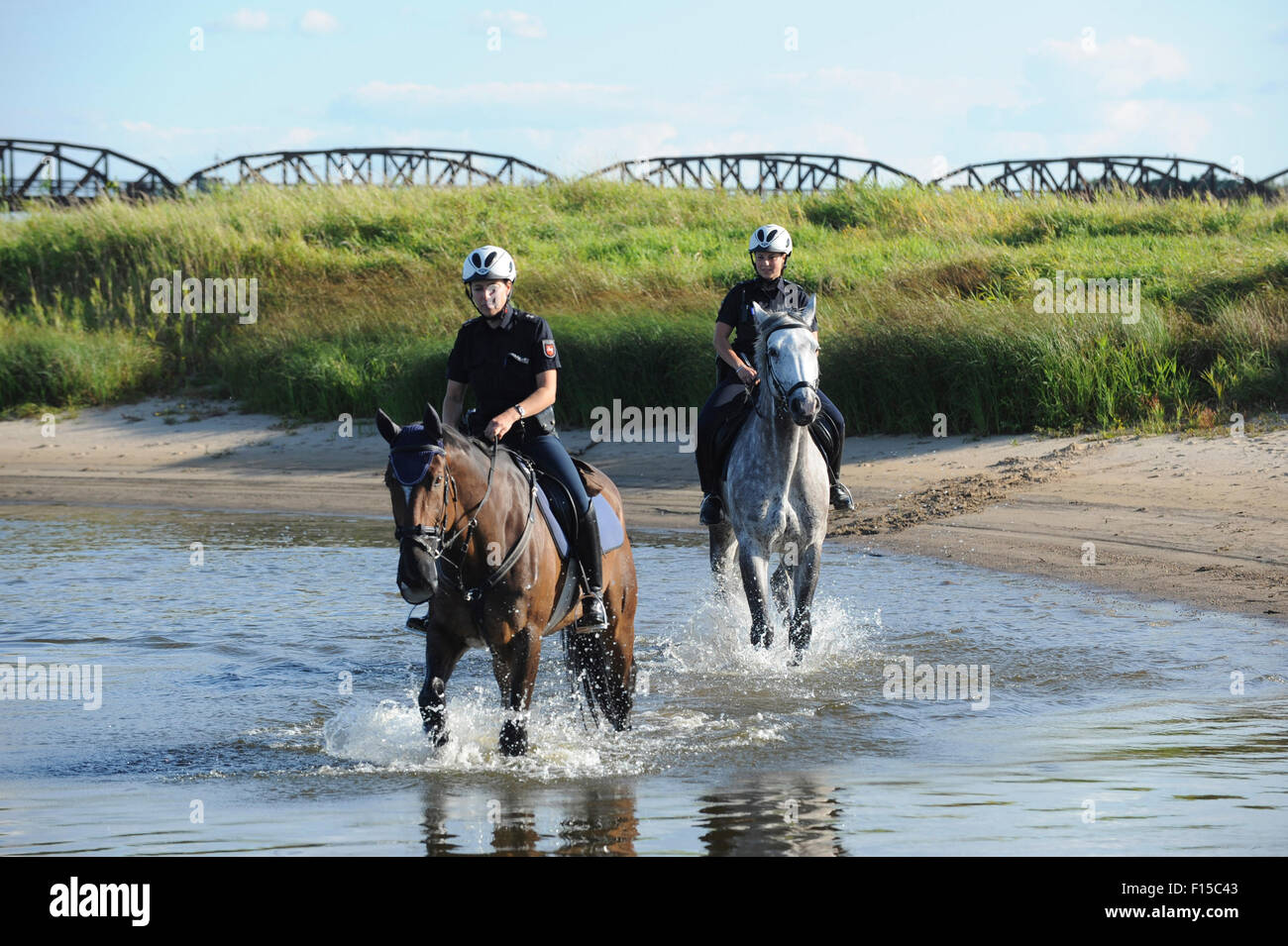Dannenberg, Germany, Lower Saxony, police officers in the biosphere reserve Elbe Valley Stock Photo