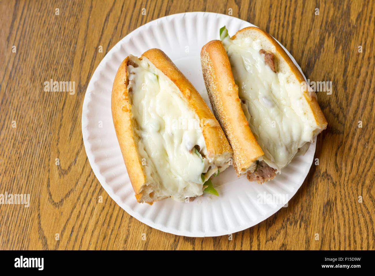 Philly Cheesesteak loaded with mozzarella cheese on submarine bun Stock